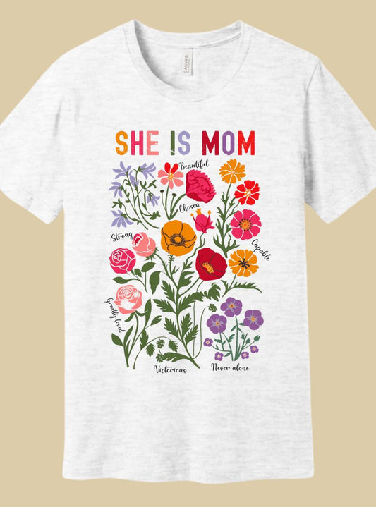 She is Mom in Bella Canvas Tee